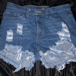 Distressed denim shorts